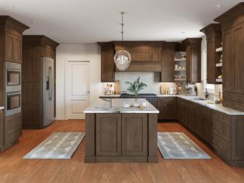 Traditional kitchen with stained wood framed cabinets and a center island